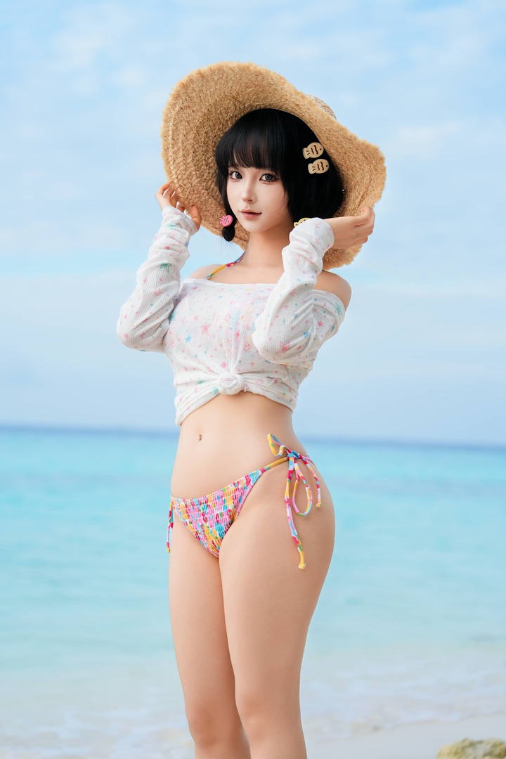 蠢沫沫夏日潮汐COS赏析：演绎草帽少女海风交织的夏日活力